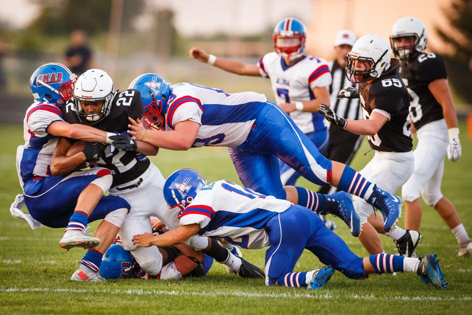 Four Score Night For Requena Leads Pekin Football Past Albia