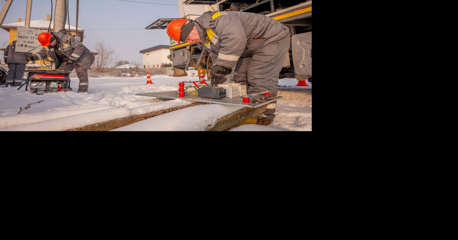 Ukrainians endure freezing temperatures at home as crews rush to restore power