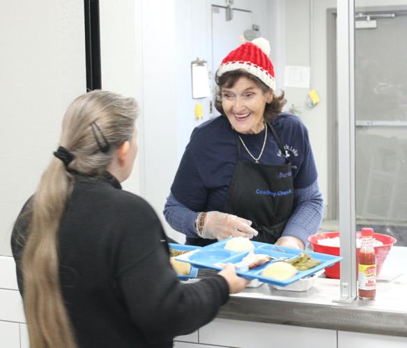 Marcella's Kitchen Christmas party feeds families News