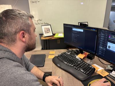 Nathan Brockett looking at overdose statistics