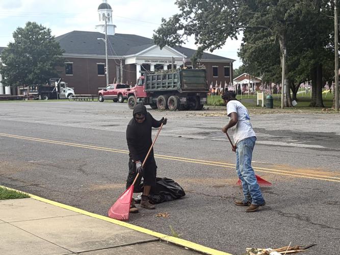 Workers cleaning up street