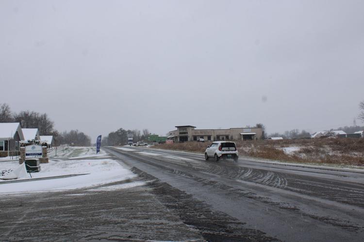 Plow crews work to clear roads amid winter storm | News | paducahsun.com