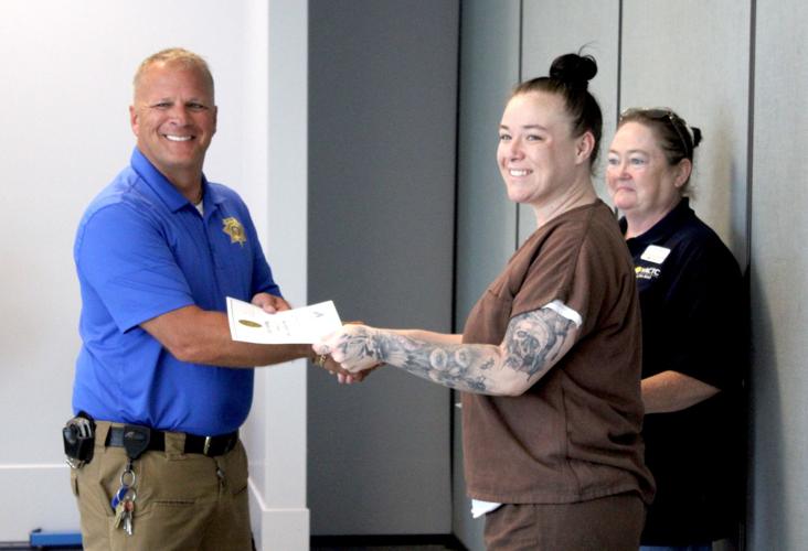 Inmate training program has first female graduation News