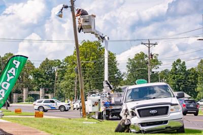 Damaged pole slows traffic briefly