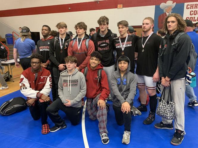 Local wrestlers bring home region tournament hardware Sports