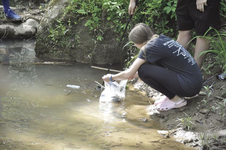PHS students complete trout raising project by releasing fish into