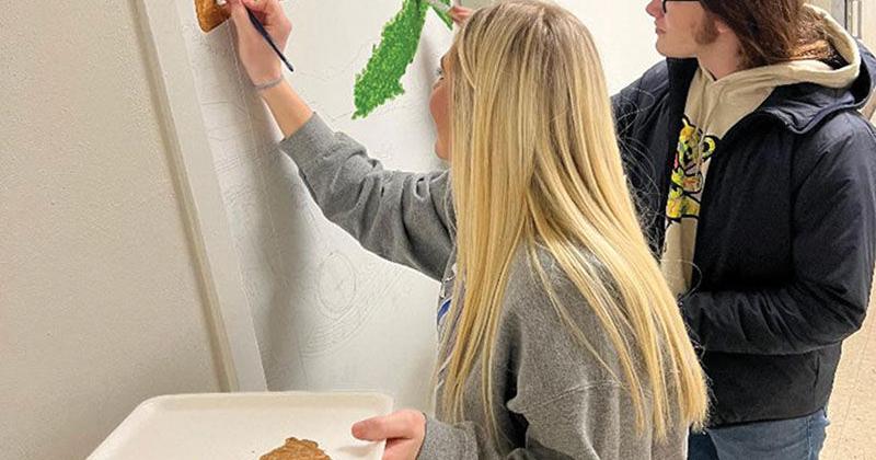 New doorway into Johnson County: PVA's office mural celebrates local pride, history, music