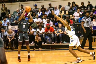 Boys Basketball Roundup: Palestine clinches playoffs with win over