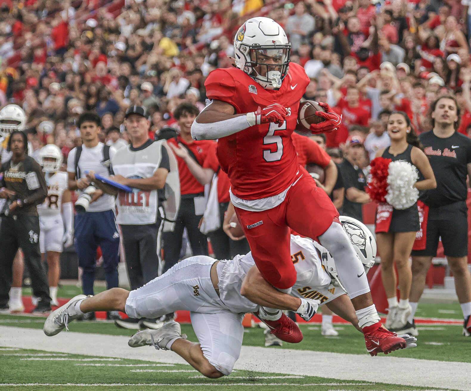 Illinois State Redbirds football team celebrating at Hancock Stadium after 76-0 victory