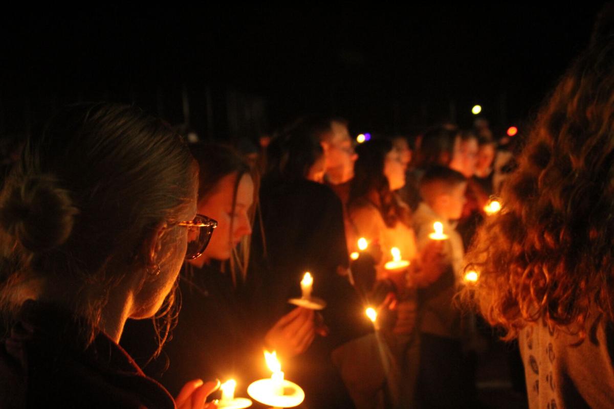 Friends, families express grief, anger during vigil