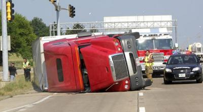 Truck overturns
