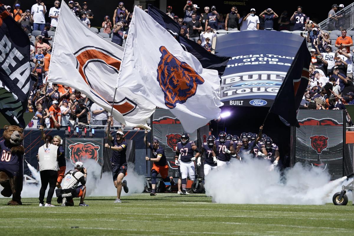 CHICAGO, IL - AUGUST 14: Chicago Bears strong safety Jordan Lucas (23) runs  with the football in warmups during a preseason game between the Chicago  Bears and the Miami Dolphins on August