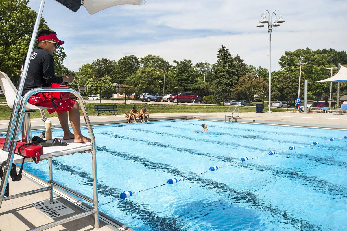 Holiday rush Pools ready despite threat of rain Local News