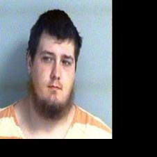 Area man charged with killing another with bow and arrow