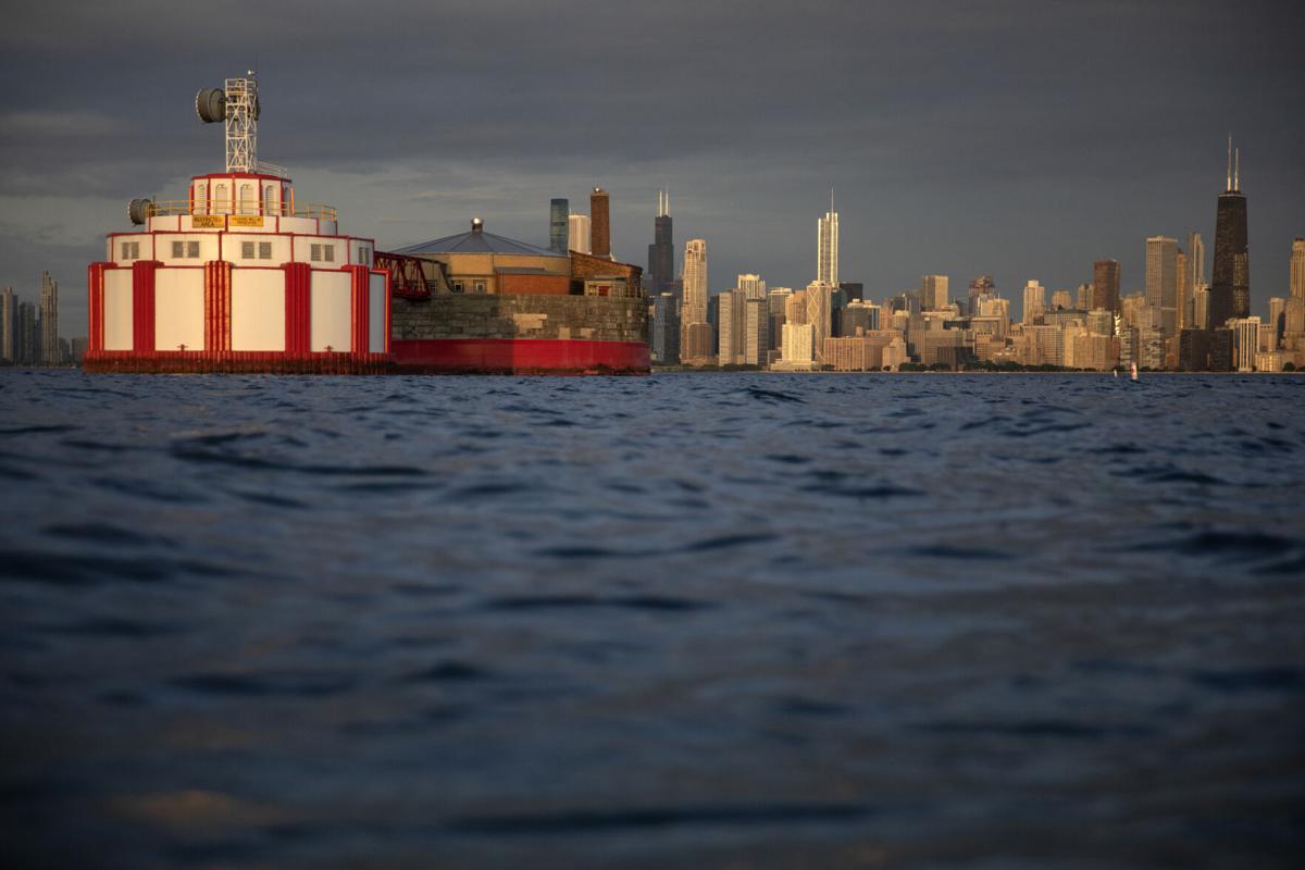 The downtown Chicago skyline can be seen beyond the Harrison-Dever water intake crib in Lake Michigan on Wednesday, June 22, 2022.