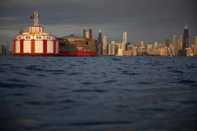 The downtown Chicago skyline can be seen beyond the Harrison-Dever water intake crib in Lake Michigan on Wednesday, June 22, 2022.