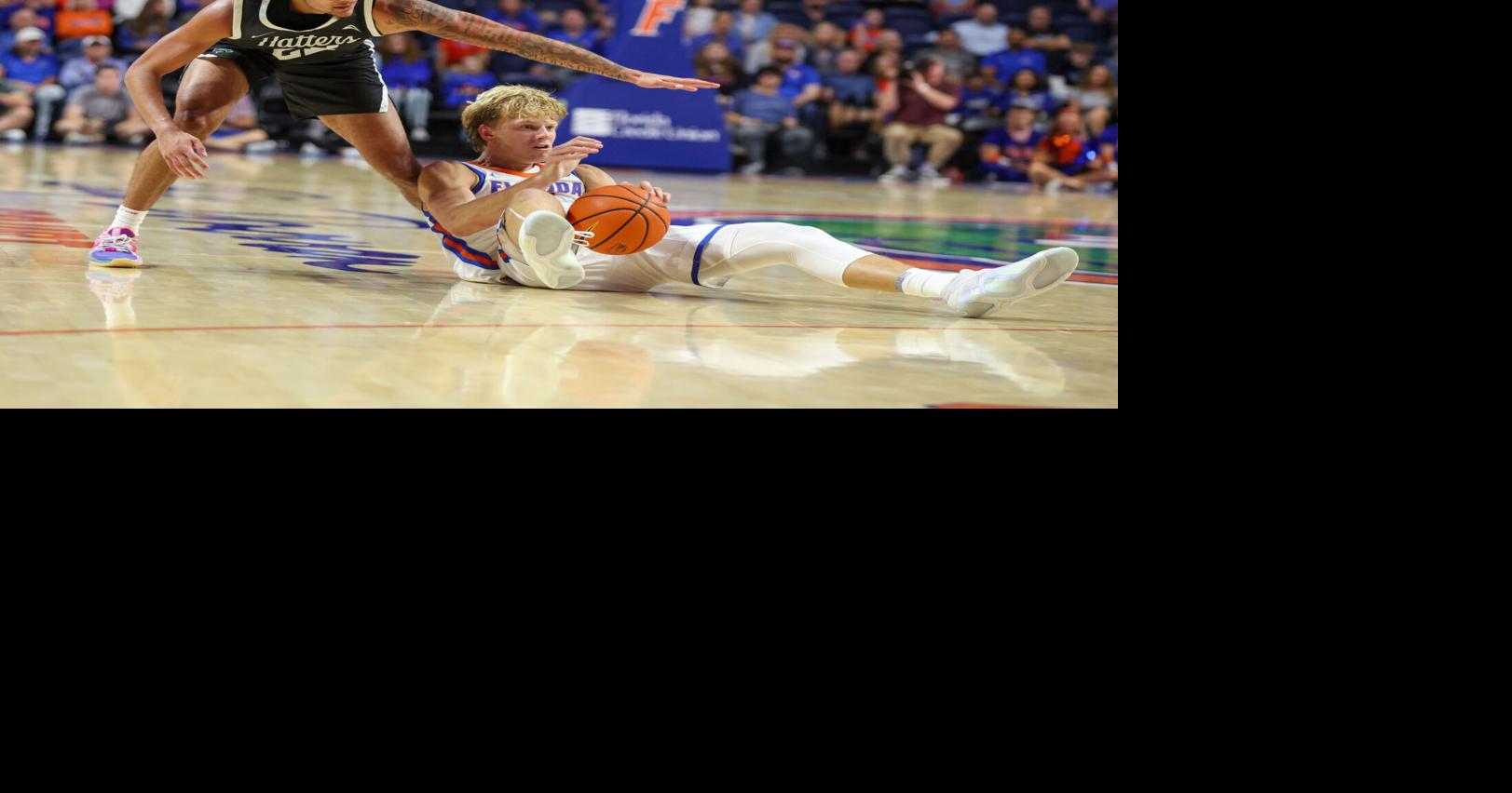 Florida Thomas Haugh (10) steals the ball from Stetson Roman Miller (23 ...