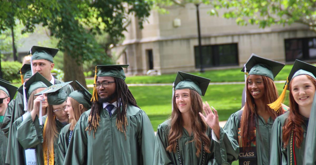 Hundreds of graduates leap into Illinois Wesleyan University commencement