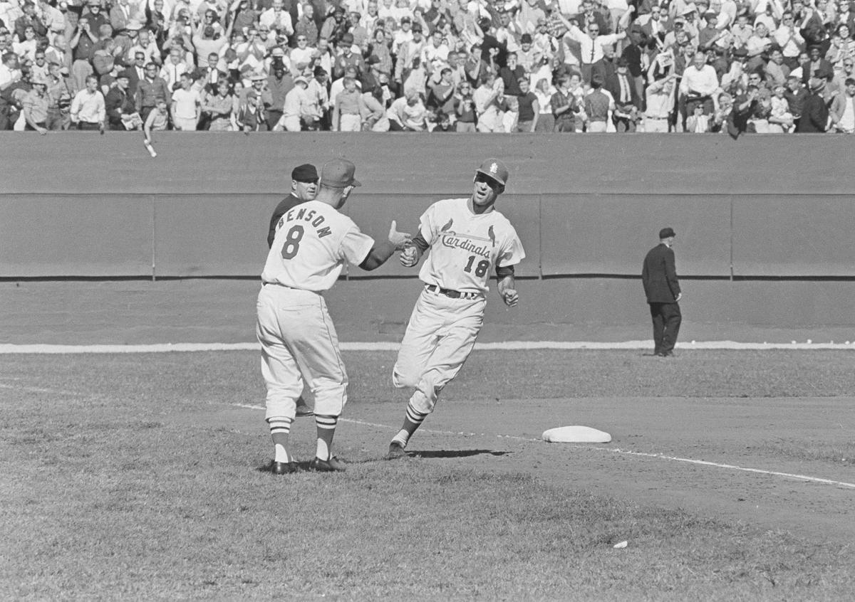 Portrait of Bob Gibson kissing fellow Cardinal Tim McCarver.