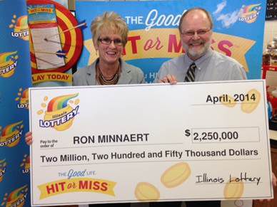 lottery check winner illinois identified graymont bank president state pantagraph jeannie ron minnaert received winning hold million hit wednesday wife