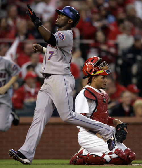 St. Louis Cardinals outfielder So Taguchi waits for the game to