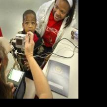 Digital fingerprinting event helps area parents protect children