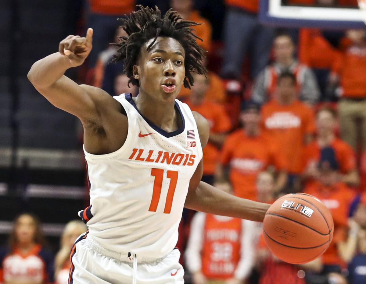 The jersey number of former Illinois player Ayo Dosunmu, now with the  Chicago Bulls, is retired during halftime of Illinois' NCAA college  basketball game against Maryland on Thursday, Jan. 6, 2022, in