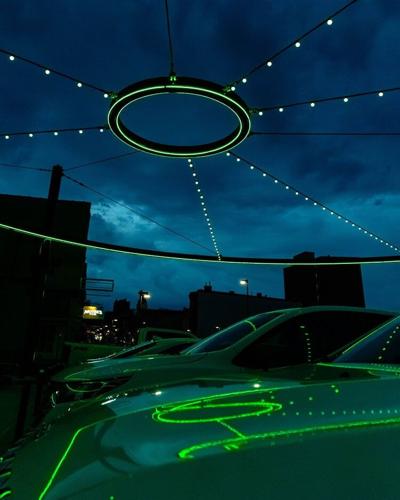 Downtown Bloomington Lights Up Green in Celebration of Illinois Wesleyan Homecoming 2026