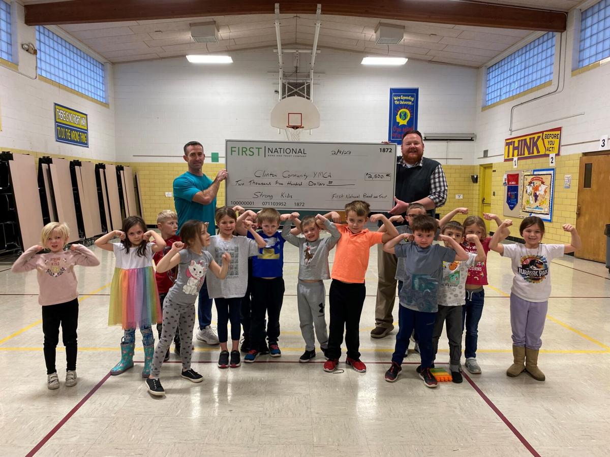 First National Bank donates to Clinton YMCA; Country Financial gives to