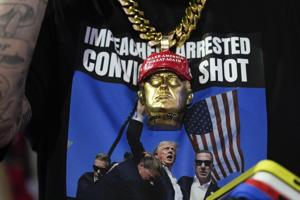 A Trump-owned company is selling $299 sneakers with an image of his bloodied face after rally shooting