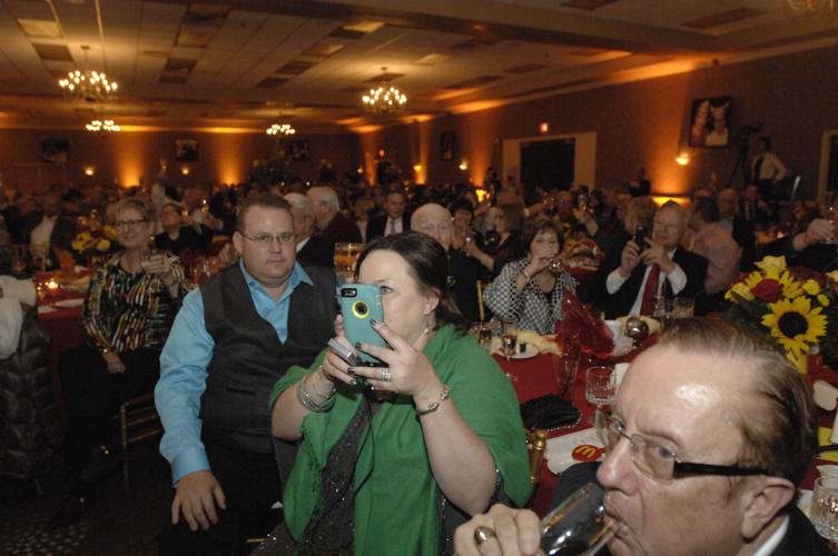Crowd recording the moment