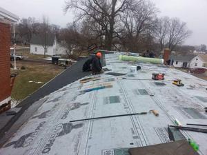 Men starting roof 2.jpg