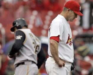 St. Louis Cardinals reliever Jason Isringhausen looks back toward