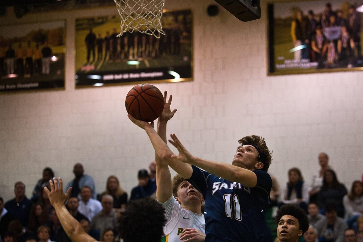 University High Basketball Team Holds Off Rival Central Catholic