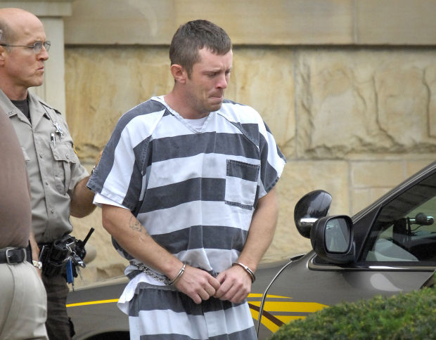 On witness stand, Harris denies killing family, claims self-defense