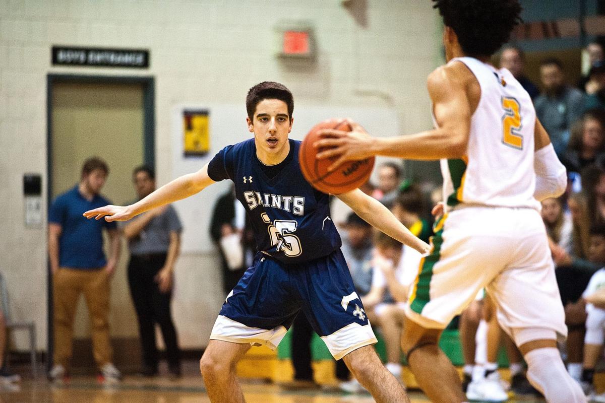 University High Basketball Team Holds Off Rival Central Catholic