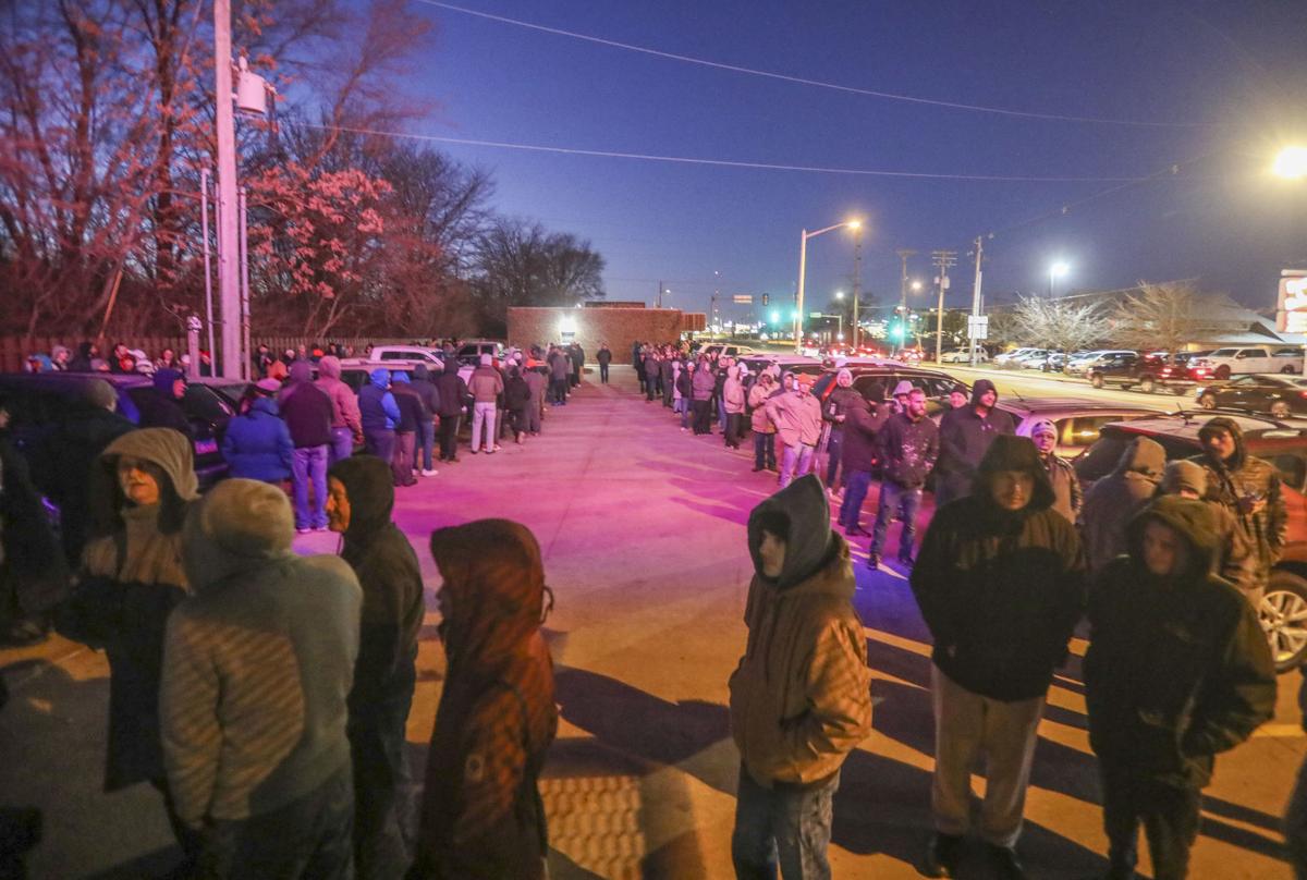 Toke 'em if you've got 'em: Hundreds show up to buy first legal recreational marijuana in Illinois