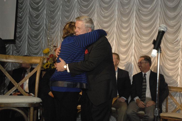 ISU first lady Marlene Dietz hugs Bob Dobski