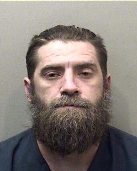 Bloomington man detained in McLean County for unlawful vehicular invasion