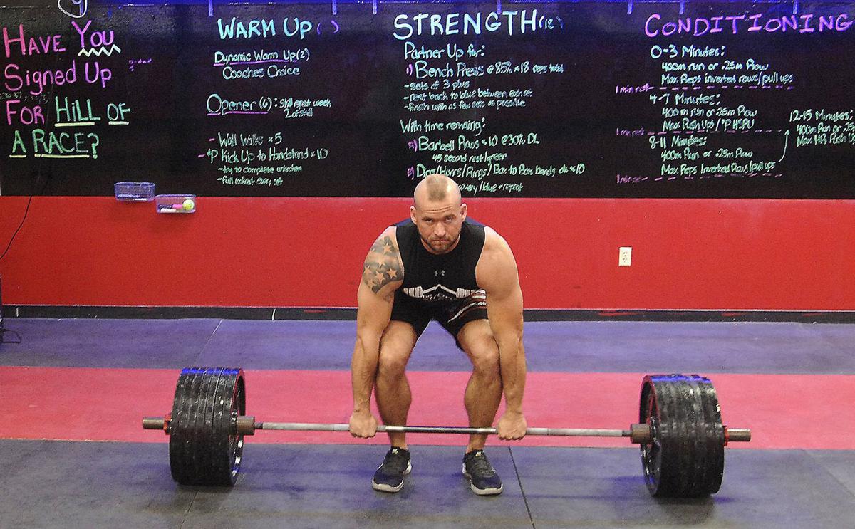 Powerlifting grandma is setting records and beating women half her