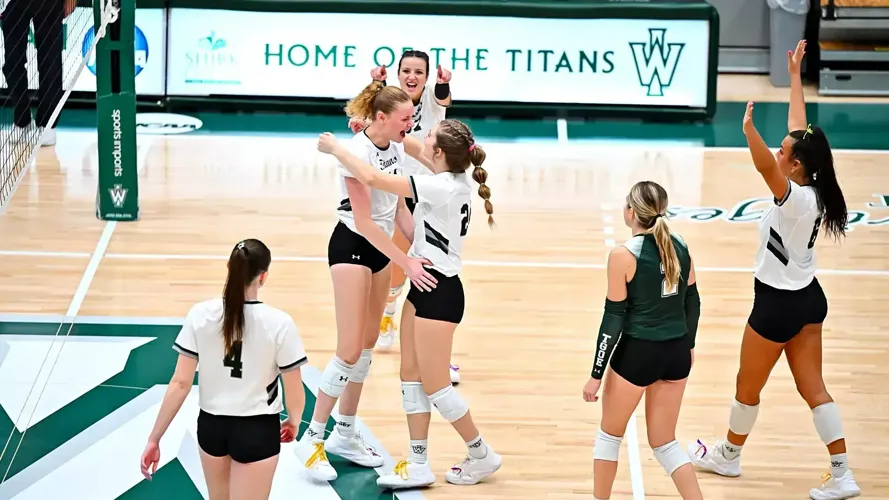 Whitaker and Palmer Power Titans Past Wittenberg in Four
