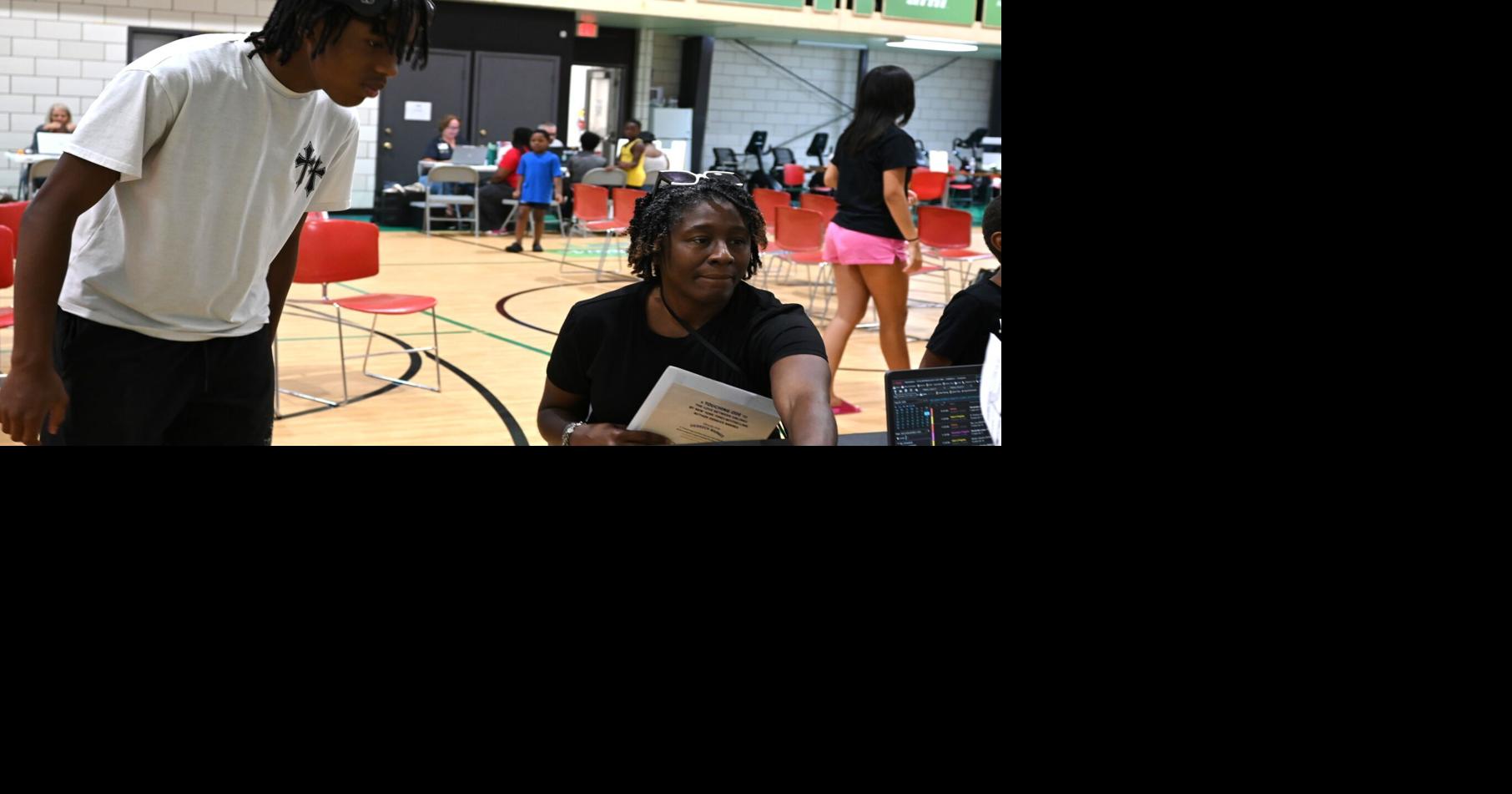 Over 100 kids visit Carle Mobile clinic to get ready for school