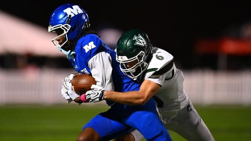 Football Downed on the Road in Decatur