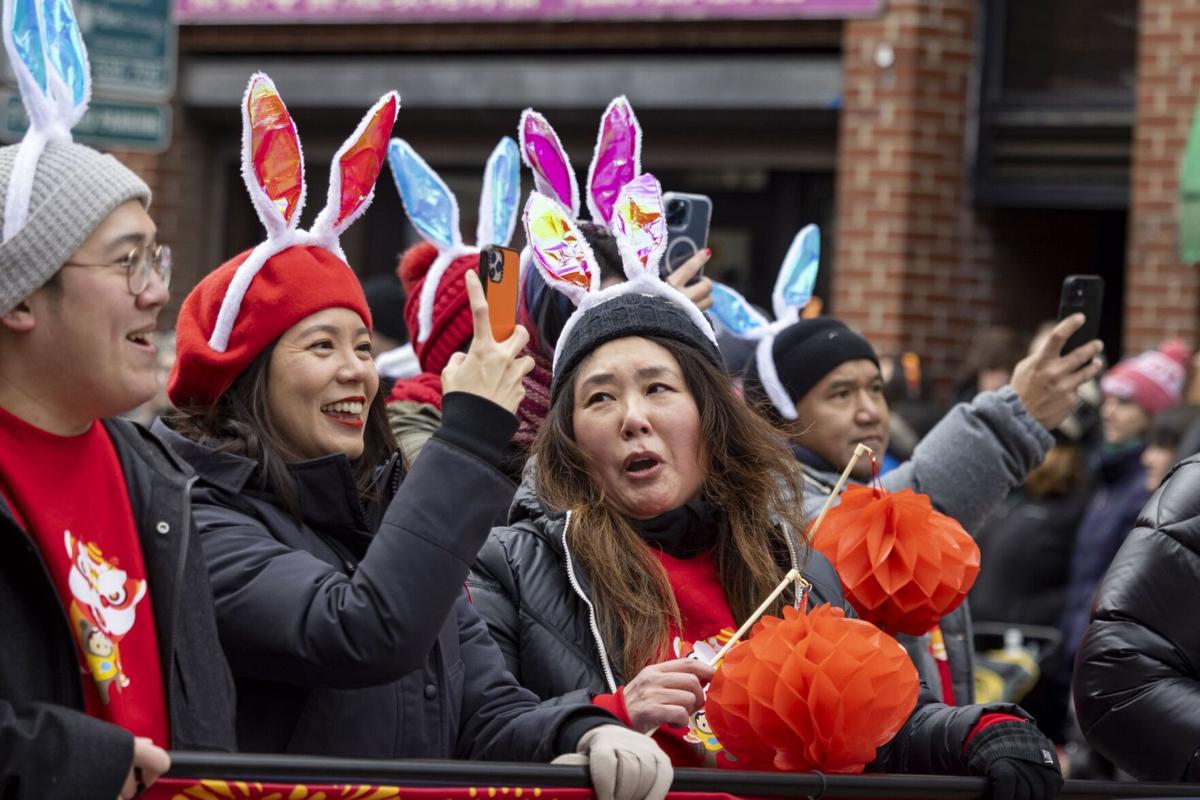 For Chinese Lunar New Year tourists, retailers roll out rabbit dances, red  lanterns