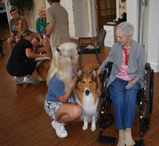 Ethel made some new friends during the WOOF (We Offer Our Friends) Therapy dog visit.