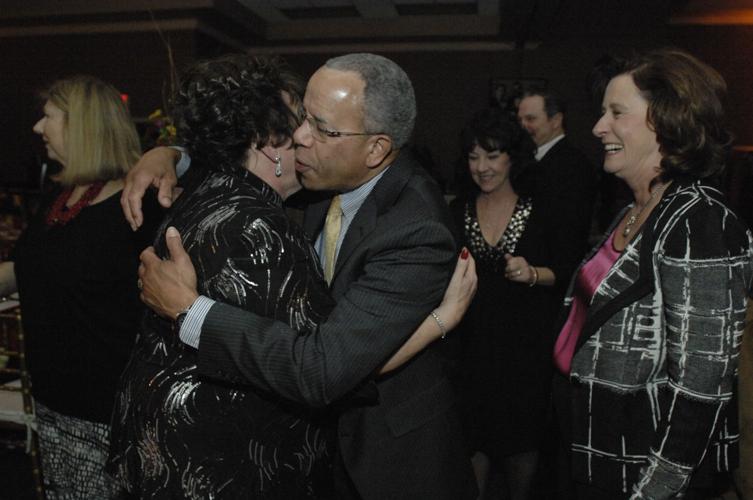Julie Dobski hugs Al Bowman