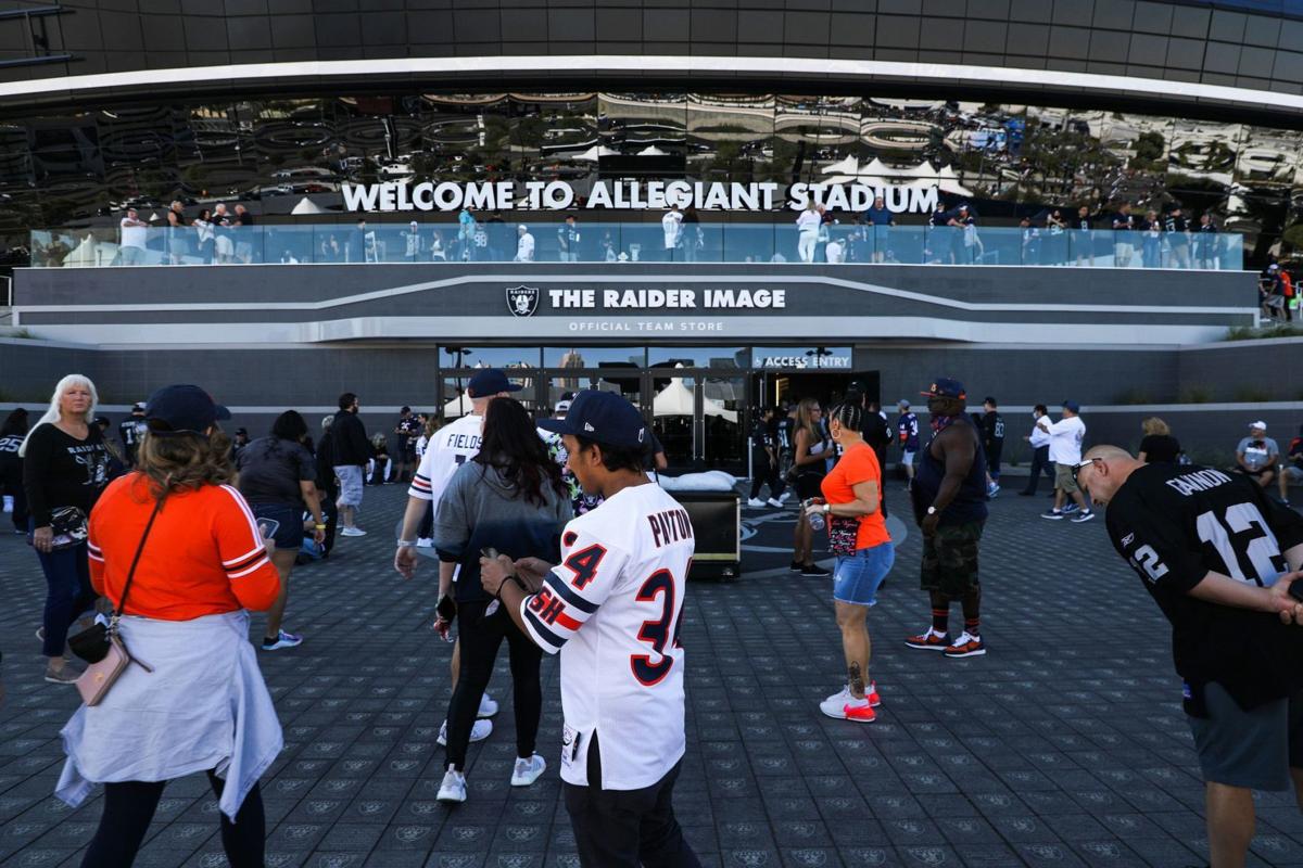 A man poses inside the Raider Image team store at Allegiant