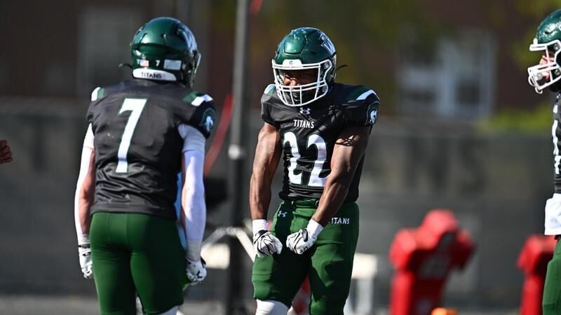 Football Overpowers Elmhurst