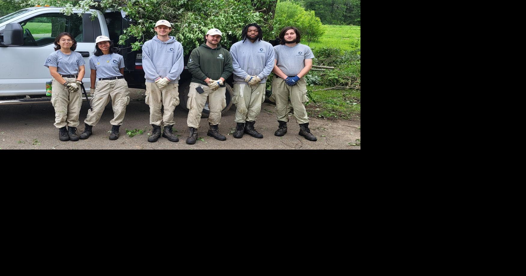 AmeriCorps team removing invasive plants at Lincoln Log Cabin, other sites