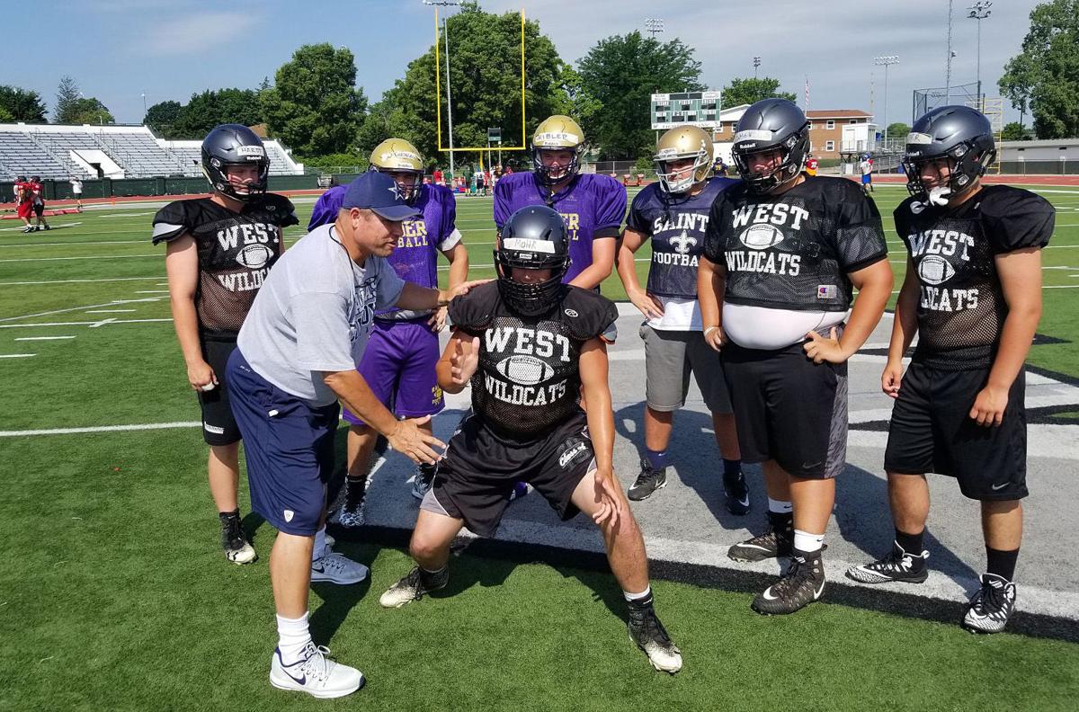 Alexander enjoys teaching high school linemen or Cowboys